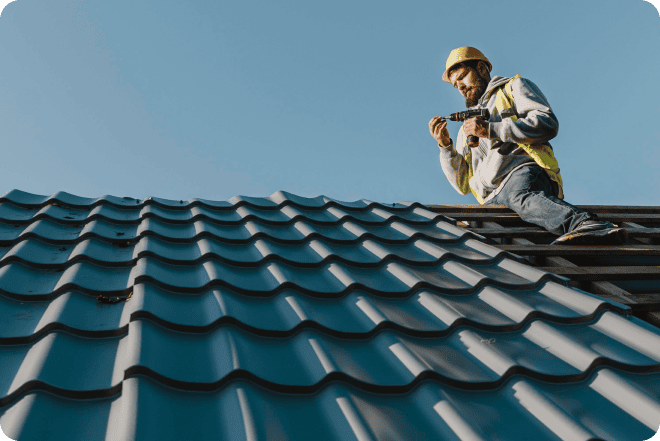 A covered roofing contractor on a job site.
